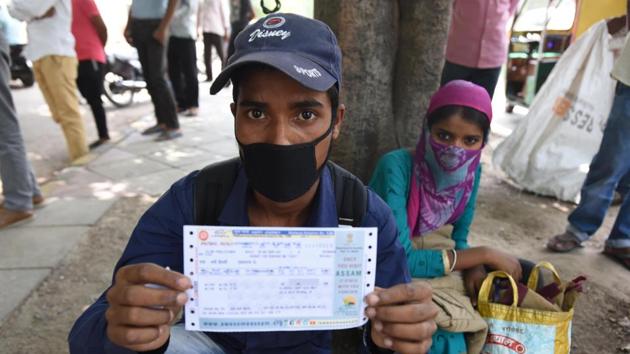 Vijay Vishwakarma, a factory worker from Mangolpuri who was allegedly kicked out of his home for not paying rent, landed at the railway station on May 28. “I thought I would immediately find a train to Pratapgarh, but the ticket is for June 2. My wife and I plan to stay here till then since we don’t have a home anymore,” Vishwakarma told HT. (Raj K Raj / HT Photo)