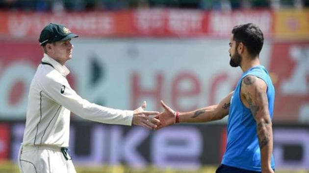 Dharamsala: Indian skipper Virat Kohli being greeted by Australia’s Steve Smith at HPCA Stadium in Dharamsala (PTI) Dharamsala: Indian skipper Virat Kohli being greeted by Australia’s Steve Smith at HPCA Stadium in Dharamsala (PTI)