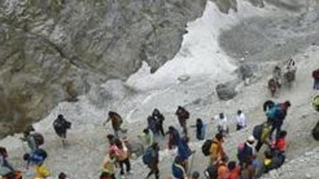 Thousands of pilgrims either take the traditional and longer 45km-long Pahalgam route or the shorter 14km-long Baltal route to Amarnath, one of Hinduism’s holiest shrines, every year. (PTI file photo) Thousands of pilgrims either take the traditional and longer 45km-long Pahalgam route or the shorter 14km-long Baltal route to Amarnath, one of Hinduism’s holiest shrines, every year. (PTI file photo)