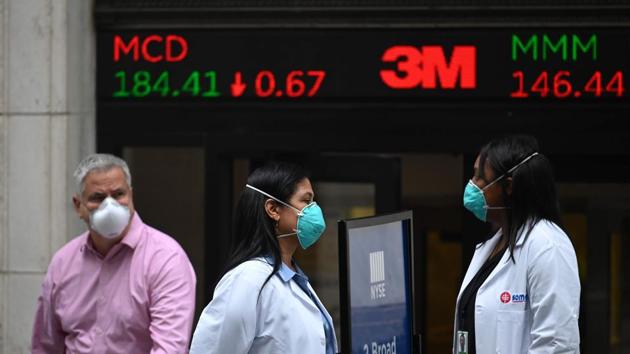 US stocks pared losses after Trump’s remarks and oil gained on hopes the dispute will not curb the economy’s nascent recovery from the coronavirus pandemic.(AFP file photo) US stocks pared losses after Trump’s remarks and oil gained on hopes the dispute will not curb the economy’s nascent recovery from the coronavirus pandemic.(AFP file photo)
