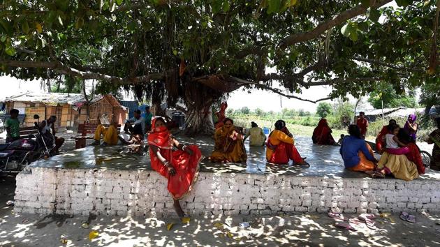 People sitting under the shade of a tree on hot summer day in New Delhi on May 26. Tarun Gopalakrishnan from the Centre for Science and Environment think-tank told AFP that India must brace for frequent periods of extreme heat in the future. (Money Sharma / AFP) People sitting under the shade of a tree on hot summer day in New Delhi on May 26. Tarun Gopalakrishnan from the Centre for Science and Environment think-tank told AFP that India must brace for frequent periods of extreme heat in the future. (Money Sharma / AFP)