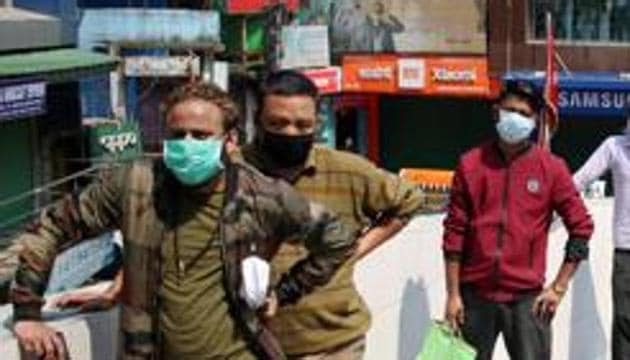 As per an order issued by district collector Manish Singh on Friday night, it was obligatory for people to wear surgical masks when they step out of their homes within the limits of the district, the official said.(ANI) As per an order issued by district collector Manish Singh on Friday night, it was obligatory for people to wear surgical masks when they step out of their homes within the limits of the district, the official said.(ANI)