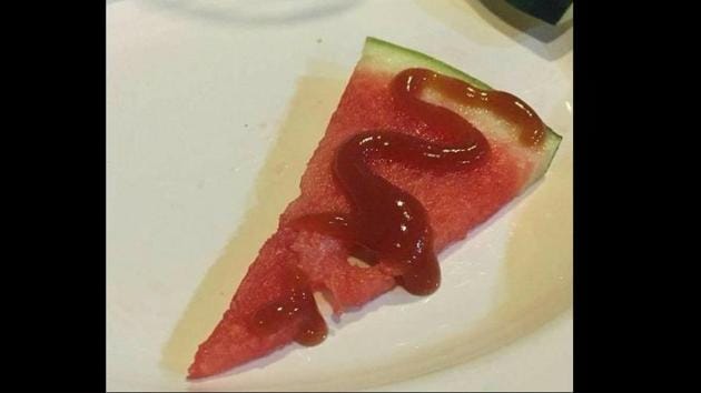 Image shows a piece of watermelon with ketchup.(Twitter/@meownextdoor)