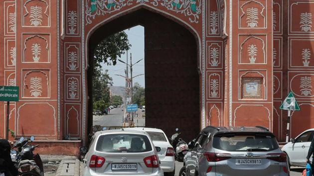 People looking to enter the walled city containment zone have parked their cars opposite Sanganeri Gate, in Jaipur.(Photo by Himanshu Vyas/ Hindustan Times)