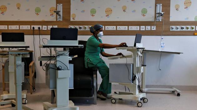 A medical worker seen at work in Max Smart Super Speciality Hospital. The hotels to be converted into quarantine facilities include JW Marriot, Le Meridien and IBIS. Two of the 10 hotels—Hotel Sheraton in Saket and Hotel Surya in New Friends Colony — will also serve as extended Covid hospitals, reported HT. (Danish Siddiqui / REUTERS)