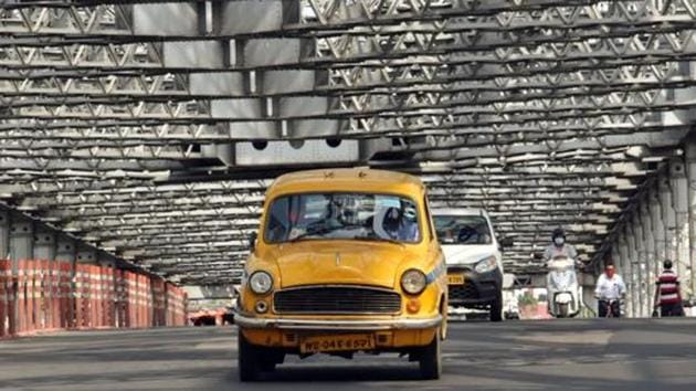 Taxis, radio taxis and auto-rickshaws have been allowed to ply with only two passengers in Kolkata and adjoining areas.(ANI PHOTO.)