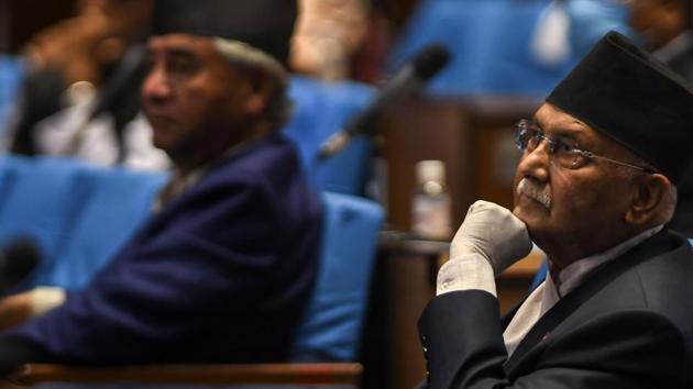 During an all-party meeting on Tuesday, Nepal’s Prime Minister Oli (R) urged the top leaders of all political parties represented in parliament to unanimously endorse the amendment bill.(AFP)