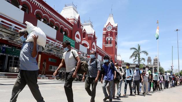 Stranded migrant labourers on the way to board a special train to Bihar from Chennai Central railway station during the lockdown.(ANI FILE)