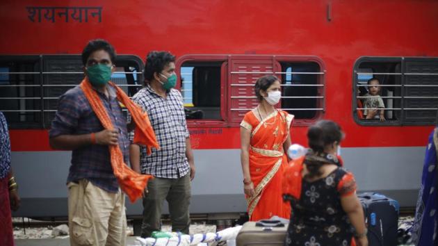 As millions of daily-wage workers who lost their livelihoods in the aftermath of the Covid-19 lockdown travel by Shramik Special trains to their states of domicile, a protocol has been put in place for transporting and handling the workers.(AP Photo) As millions of daily-wage workers who lost their livelihoods in the aftermath of the Covid-19 lockdown travel by Shramik Special trains to their states of domicile, a protocol has been put in place for transporting and handling the workers.(AP Photo)