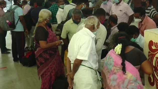 Tamil Nadu: Passengers arrive at Madurai Railway Station to board trains to their respective destinations, as Indian Railways has started operations of 200 passenger trains today. (ANI) Tamil Nadu: Passengers arrive at Madurai Railway Station to board trains to their respective destinations, as Indian Railways has started operations of 200 passenger trains today. (ANI)