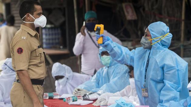 Health workers conducting Covid-19 coronavirus testing drive. (Satyabrata Tripathy/HT Photo) Health workers conducting Covid-19 coronavirus testing drive. (Satyabrata Tripathy/HT Photo)