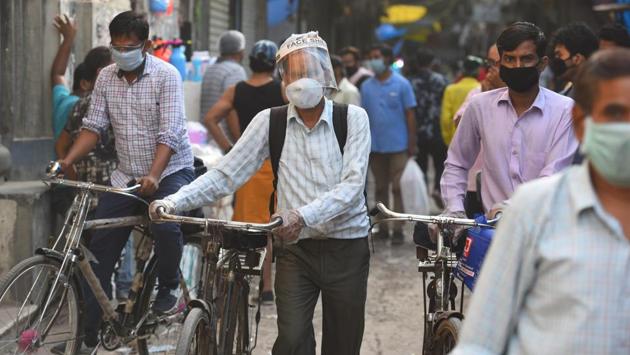 People in close proximity of each other at Bhagirathi market, New Delhi on May 30. “With easing of lockdown norms and more people moving about, the number of cases are bound to go up further. The lockdown could never have prevented the spread of the infection completely, but it gave the government time to prepare for a surge in cases,” Dr Jugal Kishore, head of the department of community medicine at Safdarjung hospital told HT. (Raj K Raj / HT PHOTO)