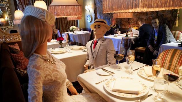 FILE PHOTO: To ensure social distancing does not make diners feel isolated during the coronavirus disease (COVID-19) outbreak, mannequins clad in 1940s-era clothing occupy some tables at The Inn at Little Washington, a Michelin three-star restaurant, which plans to reopen soon in Washington, Virginia, U.S., May 20, 2020. REUTERS/Kevin Lamarque/File Photo (REUTERS)