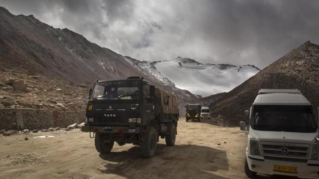 In this file photo, an Indian Army truck crosses Chang la pass near Pangong Lake in Ladakh region, in India.(AP Photo)
