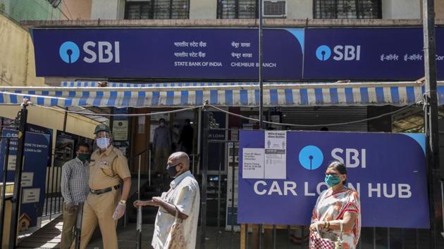 Customers wait in line at a State Bank of India (SBI) branch in Mumbai. BBB, the headhunter for state-owned banks and financial institutions, is headed by former Department of Personnel and Training Secretary B P Sharma. (Bloomberg) Customers wait in line at a State Bank of India (SBI) branch in Mumbai. BBB, the headhunter for state-owned banks and financial institutions, is headed by former Department of Personnel and Training Secretary B P Sharma. (Bloomberg)