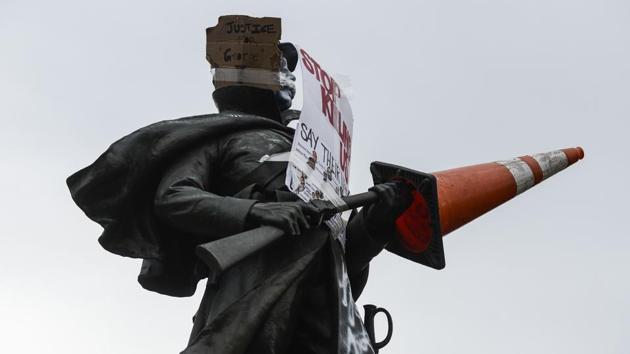A vandalized Civil War statue seen on the fourth consecutive day of protests in the aftermath of the death of George Floyd on May 31 in Denver, Colorado. Riot police also clashed with protesters in New York, Chicago, Philadelphia and LA, firing tear gas and pepper bullets to try and disperse crowds. (Michael Ciaglo / AFP)