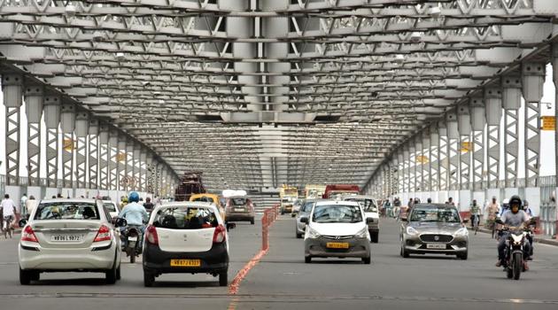 Vehicles ply on a Howrah Bridge during the nationwide lockdown 5 imposed in the wake Covid-19 pandemic in Kolkata on Monday. (ANI photo) Vehicles ply on a Howrah Bridge during the nationwide lockdown 5 imposed in the wake Covid-19 pandemic in Kolkata on Monday. (ANI photo)