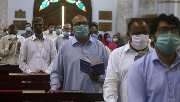Christians wearing face masks to help curb the spread of the coronavirus attend Sunday Mass at Cathedral Church in Peshawar, Pakistan on Sunday. (AP File Photo) Christians wearing face masks to help curb the spread of the coronavirus attend Sunday Mass at Cathedral Church in Peshawar, Pakistan on Sunday. (AP File Photo)