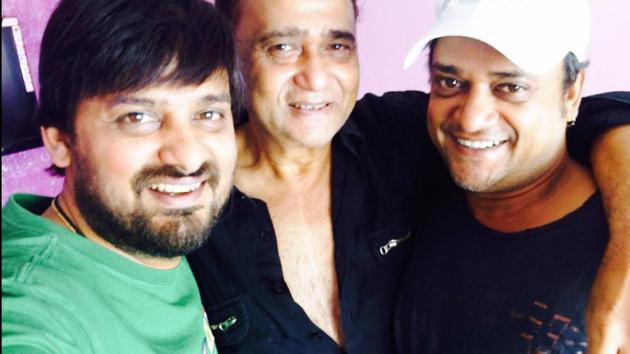 Wajid Khan (left) with father and brother.