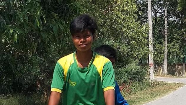 Archana Yadav and her brother carrying javelin on cycle.(Special Arrangement.)