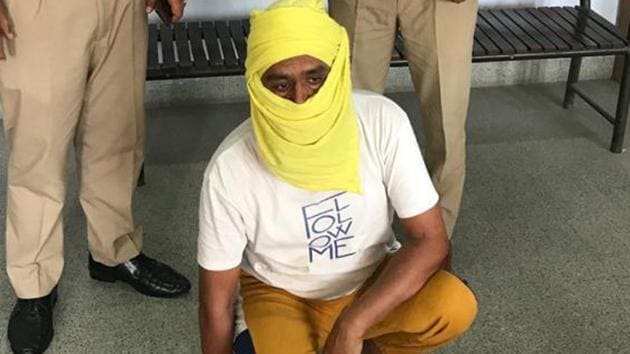 The drug peddler in police custody on Tuesday. (HT Photo) The drug peddler in police custody on Tuesday. (HT Photo)