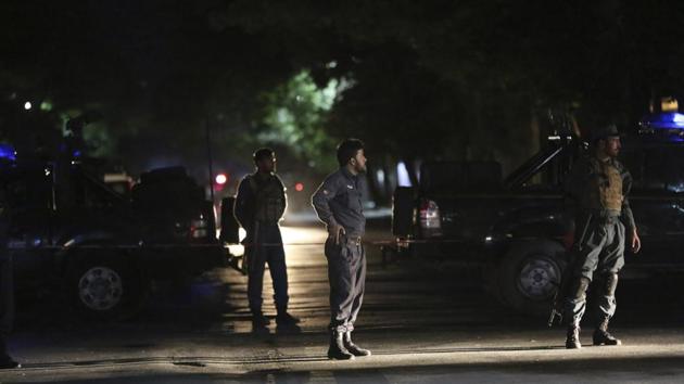 Afghan police arrive at the site of a bombing in a mosque in Kabul, Afghanistan.(AP) Afghan police arrive at the site of a bombing in a mosque in Kabul, Afghanistan.(AP)