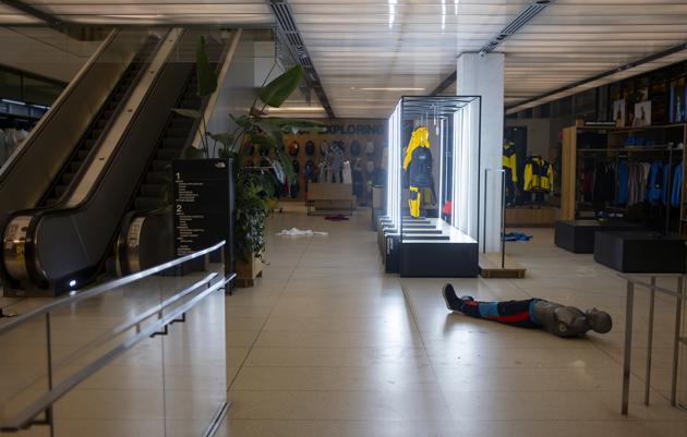 In this Monday, June 1, 2020, photo, a mannequin lies on the floor of a damaged outdoor clothing store in Midtown Manhattan after the shop was broken into following unrest in the wake of the death of George Floyd. (AP Photo/Craig Ruttle)(AP)