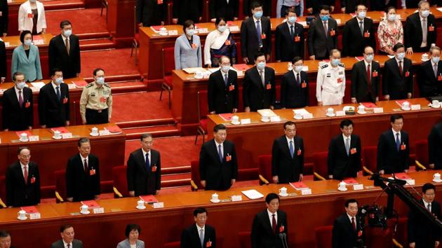 Chinese President Xi Jinping and other officials, some wearing face masks following the coronavirus disease (COVID-19) outbreak, attend the closing session of the National People's Congress (NPC) at the Great Hall of the People in Beijing, China. (REUTERS) Chinese President Xi Jinping and other officials, some wearing face masks following the coronavirus disease (COVID-19) outbreak, attend the closing session of the National People's Congress (NPC) at the Great Hall of the People in Beijing, China. (REUTERS)