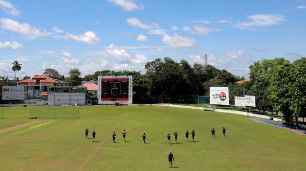 Sri Lankan national cricket team members practice keeping a one meter distance. (REUTERS)