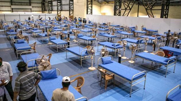 Mumbai: Workers prepare a quarantine centre for COVID-19 patients at Bombay Exhibition Centre, during the nationwide lockdown in wake of the coronavirus pandemic, at Goregaon in Mumbai, Monday, June 1, 2020.(PTI)