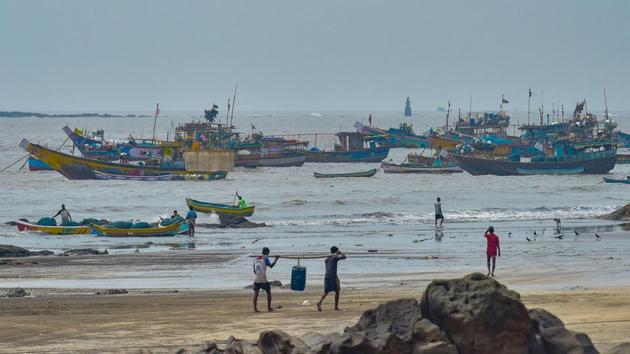 Fishing boats anchored at the shore following a warning by Indian Meteorological Department (IMD) for the fishermen to not enter the Arabian Sea for the next two days as a precaution against cyclone 'Nisarga', at Uttan beach in Thane. (PTI) Fishing boats anchored at the shore following a warning by Indian Meteorological Department (IMD) for the fishermen to not enter the Arabian Sea for the next two days as a precaution against cyclone 'Nisarga', at Uttan beach in Thane. (PTI)