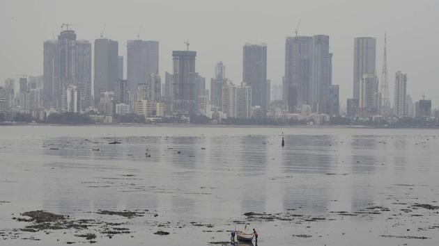 Fishermen with their boat at Mahim Beach as red alert is issued due to the possibility of Cyclone Nisarga, in Mumbai, Tuesday, June 2, 2020.(PTI photo) Fishermen with their boat at Mahim Beach as red alert is issued due to the possibility of Cyclone Nisarga, in Mumbai, Tuesday, June 2, 2020.(PTI photo)