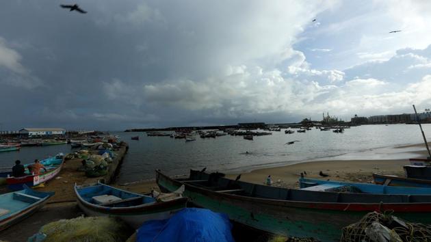 Fishing boats close to shore as the weather turns in Vizhinjam. The rice and tea growing region in north-eastern parts could receive 96% rainfall this year, while rice, rubber and coffee growing southern India could get 102% rains. (Vivek Nair / HT Photo)