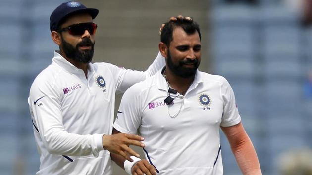 India's Mohammed Shami, right, celebrates the wicket of South Africa's Senuran Muthusamy(AP)