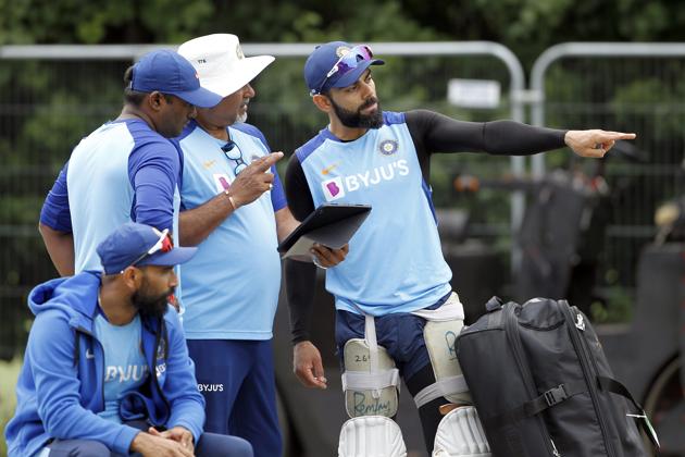 Indian skipper Virat Kohli interacts Indian Bowling coach Bharat Arun during the practice session. (ANI) Indian skipper Virat Kohli interacts Indian Bowling coach Bharat Arun during the practice session. (ANI)