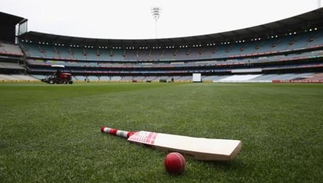 A bat and ball are seen on the turf(Getty Images)