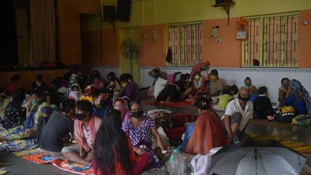 The residents of Pattharwadi, in Mumbai’s Mahim shifted by the police ahead of Cyclone Nisarg’s landfall.(Vijayanand Gupta/HT Photo) The residents of Pattharwadi, in Mumbai’s Mahim shifted by the police ahead of Cyclone Nisarg’s landfall.(Vijayanand Gupta/HT Photo)