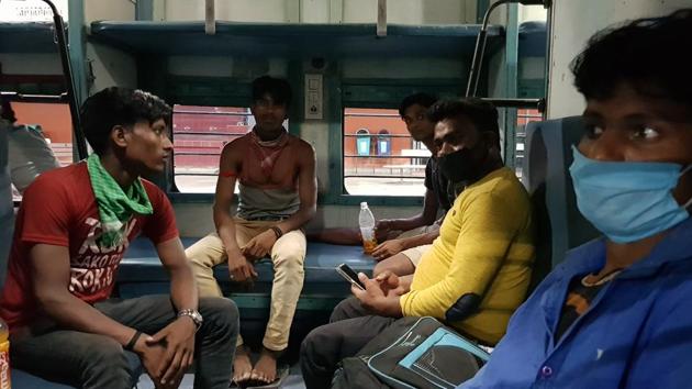 Migrant workers aboard the Pushpak Express Special in Lucknow, Uttar Pradesh, on June 3, 2020. They were on their way back to Bhopal where they were working before the nationwide lockdown was imposed to stop the spread of Covid-19 pandemic.(HT Photo)