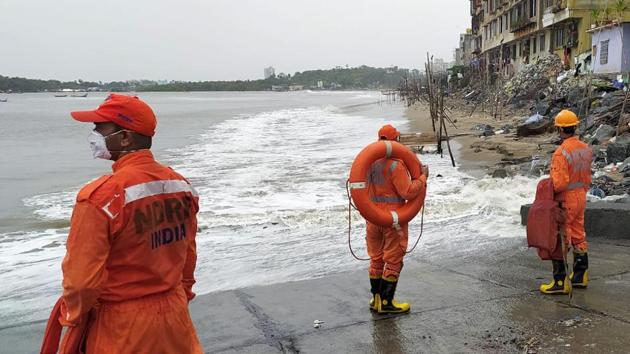 NDRF presonnel deployed at Versova beach before the landfall of cyclone Nisarga in Mumbai on Wednesday.(ANI Photo)