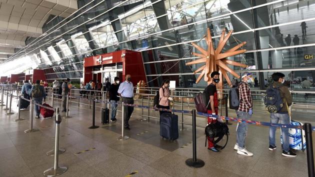 Passengers queue to get their documents verified before entering the IGI Airport amid the lockdown, in New Delhi, India, on Saturday, May 30, 2020. (Sanjeev Verma/HT PHOTO) Passengers queue to get their documents verified before entering the IGI Airport amid the lockdown, in New Delhi, India, on Saturday, May 30, 2020. (Sanjeev Verma/HT PHOTO)