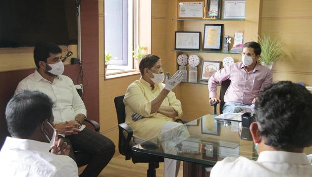 Pune MP Girish Bapat (centre), BJP leaders met the four IAS officers and PMC officials on Tuesday to discuss Covid strategy.(RAVINDRA JOSHI/HT)