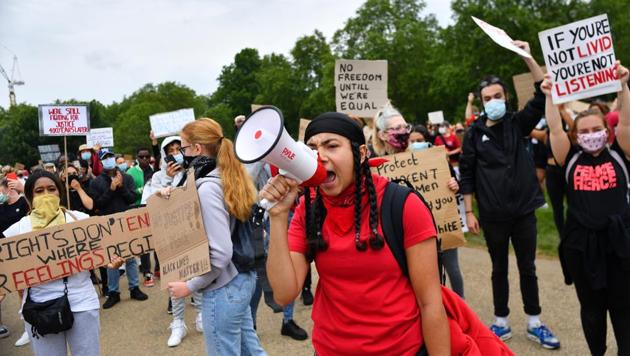 A person shouts into a megaphone in Hyde Park during a "Black Lives Matter" protest following the death of George Floyd who died in police custody in Minneapolis, London, Britain on June 3, 2020. (Reuters Photo) A person shouts into a megaphone in Hyde Park during a "Black Lives Matter" protest following the death of George Floyd who died in police custody in Minneapolis, London, Britain on June 3, 2020. (Reuters Photo)