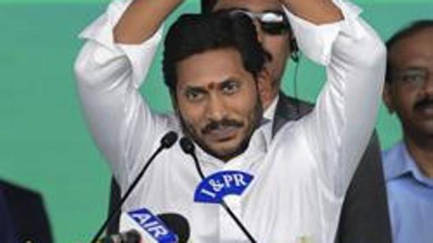 Newly elected Andhra Pradesh Chief Minister YS Jaganmohan Reddy gestures during his swearing-in ceremony, at the Indira Gandhi Municipal Stadium in Vijayawada. (PTI) Newly elected Andhra Pradesh Chief Minister YS Jaganmohan Reddy gestures during his swearing-in ceremony, at the Indira Gandhi Municipal Stadium in Vijayawada. (PTI)