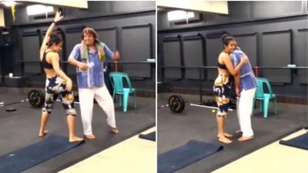 Ranjeet dancing with his daughter.