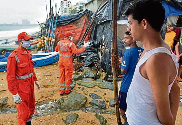 An NDRF team, which was deployed at Thane district, has been diverted to Srivardhan in the south of Raigad to carry out an assessment of the damages caused by the cyclone.(Satyabrata Tripathy/HT Photo)