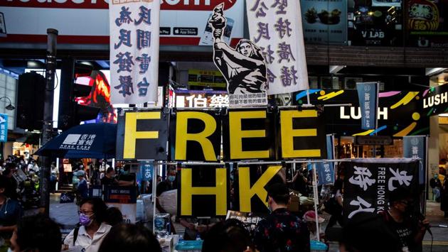 A large display showing the Goddess of Democracy is seen on a pavement near Victoria Park in Hong Kong. In response to pro-democracy demonstrations, last month Beijing announced plans to impose the security law, which would cover secession, subversion of state power, terrorism and foreign interference. (Issac Lawrence / AFP) A large display showing the Goddess of Democracy is seen on a pavement near Victoria Park in Hong Kong. In response to pro-democracy demonstrations, last month Beijing announced plans to impose the security law, which would cover secession, subversion of state power, terrorism and foreign interference. (Issac Lawrence / AFP)