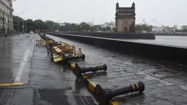 Strong metal railings lay flat on the ground opposite the Taj Mahal Hotel in Colaba, Mumbai as Cyclone Nisarga swept past the city on June 3, after it made landfall near Alibag in the afternoon. (Bhushan koyande / HT) Strong metal railings lay flat on the ground opposite the Taj Mahal Hotel in Colaba, Mumbai as Cyclone Nisarga swept past the city on June 3, after it made landfall near Alibag in the afternoon. (Bhushan koyande / HT)