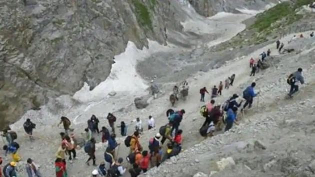 Devotees during their pilgrimage to the holy cave shrine of Amarnath, in Baltal, Jammu and Kashmir in July 2019.(PTI File Photo)