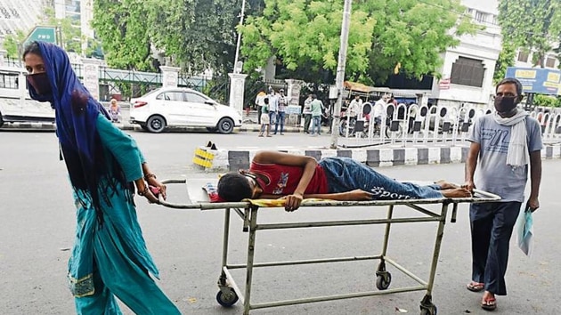Parents of a non-Covid patient from Maharajganj ran from pillar to post in Lucknow for getting their son admitted to hospital as government hospitals mostly focused on Covid patients and most private hospitals closed shop due to strict guidelines. The couple with their ailing son spent 12 days on the streets and finally left for their hometown in May-end.(Dheeraj Dhawan/HT file photo) Parents of a non-Covid patient from Maharajganj ran from pillar to post in Lucknow for getting their son admitted to hospital as government hospitals mostly focused on Covid patients and most private hospitals closed shop due to strict guidelines. The couple with their ailing son spent 12 days on the streets and finally left for their hometown in May-end.(Dheeraj Dhawan/HT file photo)