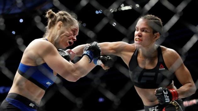 Amanda Nunes beats Ronda Rousey. (AP) Amanda Nunes beats Ronda Rousey. (AP)